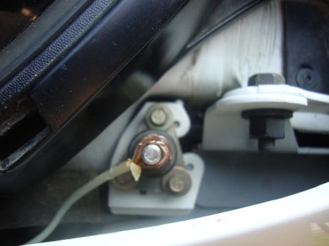 2002 Chevrolet Silverado 1500 - A close-up view of an electrical connection point on a vehicle, possibly related to an antenna delete.