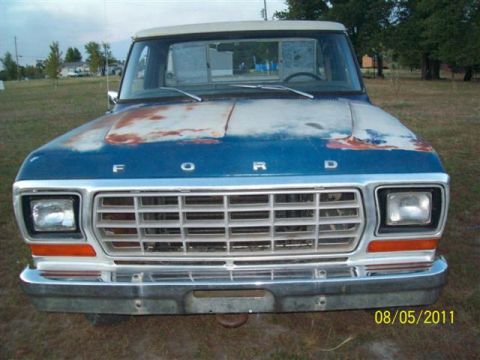 1979 Ford F-150 - This 1979 Ford F-150 shows its age with a rusty hood, but the grille remains intact.
