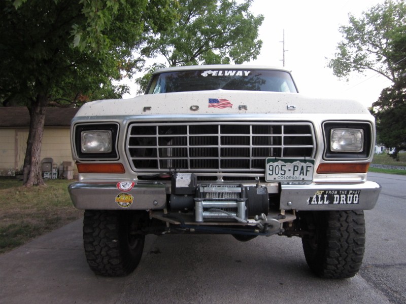 White 1978 Ford Bronco front view with winch and Colorado license plate