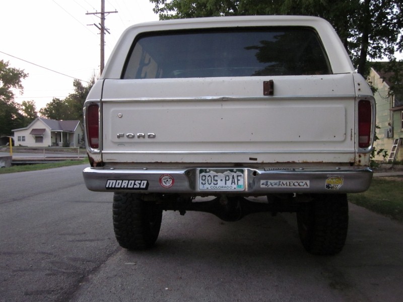 White 1978 Ford Bronco rear with Colorado license plate 905-PAF and Moroso sticker