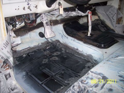 1973 Ford F-250 - Interior floor of a 1973 Ford F-250 undergoing restoration, with old sound deadening removed.