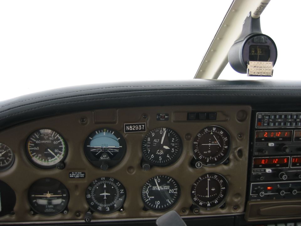 Light aircraft cockpit instrument panel with steam gauges, tail number N82937