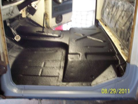 1973 Ford F-250 - The interior floor of a 1973 Ford F-250 has been coated with a protective spray-on liner.