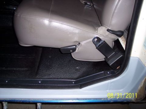 1973 Ford F-250 - Interior view of a vehicle, showing the seat and floor mat. The date 08/31/2011 is visible.