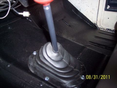 1973 Ford F-250 - Interior view of a vehicle's floor mat and gear shifter, with a date stamp visible.