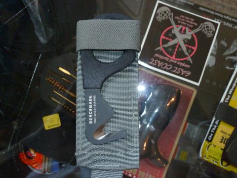 1992 Ford Mustang - A Benchmade seatbelt cutter is shown with its NSN number visible.