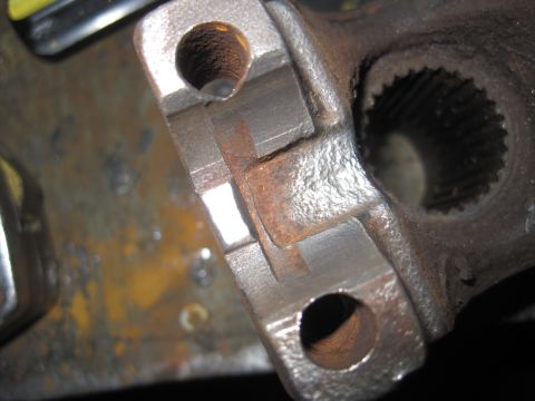 1979 Ford Bronco - Close-up view of a rusty metal component, likely from a vehicle's suspension system.