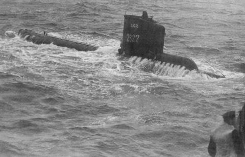 1991 Ford Bronco - Two submarines navigate through rough seas, with one displaying the identification number 2322.