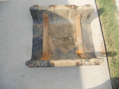 1991 Ford Bronco - This heavily rusted metal part is not a 1991 Ford Bronco, but a component from a vehicle.