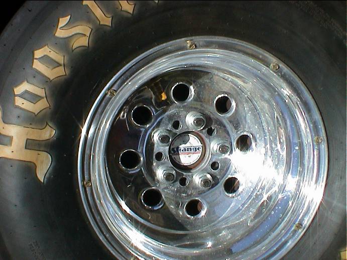 Strange 35 spline axels with 4.75 bolt pattern (Chevy) with 5/8 studs. I drilled new holes in brake drums These Weld Draglite's have a 4.5 and 4.75 pattern. Not much call for drag rims valve stem hole in the middle for (tubes) For Ford truck 5.5