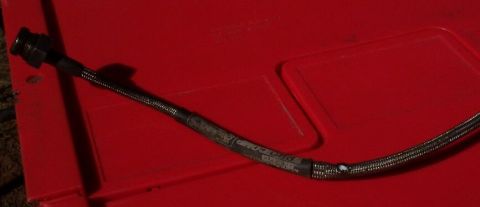 1990 Ford Bronco - While acting as winch anchor for the Dodge I had an Earl's extended front brake line let go; it just popped a hole in the body of the line.…