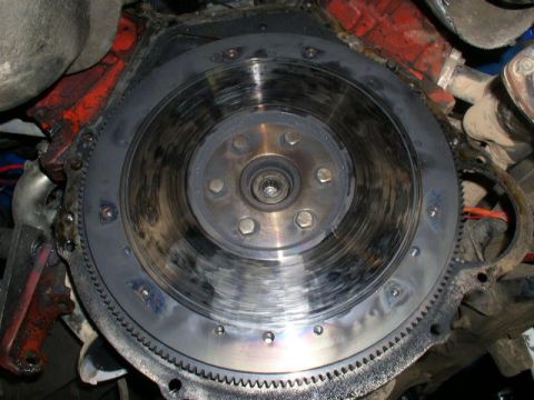 1979 Ford Bronco - The image shows a close-up view of an engine's flywheel, a critical component in the drivetrain system.