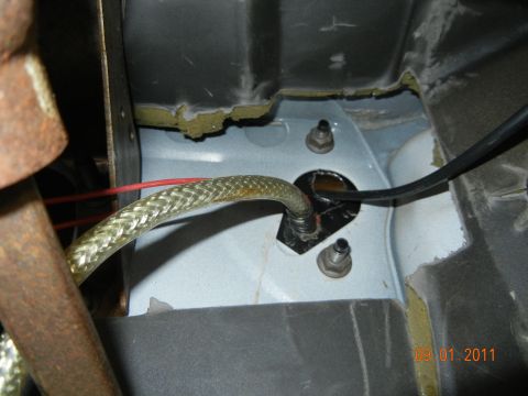 1996 Ford Bronco - Right above the driver's feet. That is the steering shaft on the left of the pic.