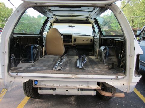 1987 Dodge 1500 - The interior of a 1987 Dodge 1500 pickup truck is shown with its interior stripped down for work.