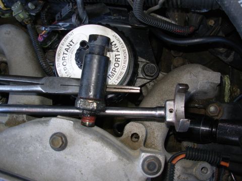 1997 Chevrolet Silverado 3500 - With the right tools, this '97 OPS can be removed with the intake & FFM in-place. That's a 1 1/16" 3/8-drive crowfoot on a 12" extension. F…
