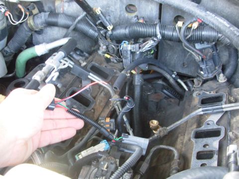 1997 Chevrolet Silverado 3500 - After cutting these 2 wires, the harness comes out. Note the 2 brass 45° elbows installed for the OPS extension (one of which cracked & lea…