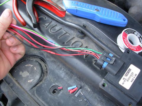 1997 Chevrolet Silverado 3500 - There's clear heat-shrink on the pink wire, and blue on the green wire. Note the staggered cuts that keep the splices from being side-by-si…