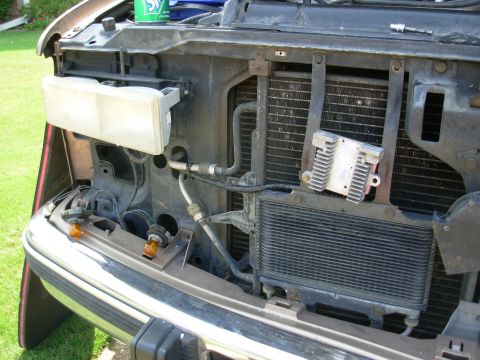 1997 Chevrolet Silverado 3500 - I drilled a hole through one ATF cooler brace & used a U-nut & bolt to attach the heat sink so it will always be in the fan's airflow, even…
