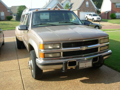 1997 Chevrolet Silverado 3500 - It's visible thru the grille, but not as obvious as a broken-down truck on the side of the road.