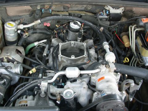 1997 Chevrolet Silverado 3500 - All the wiring still reaches. I deleted the wiring support brace behind the FFM because of interference with the inlet line. The long bolts…