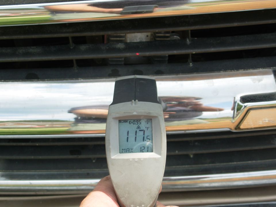 After idling for ~15min in ~100° weather, the hottest spot I can find is 121°F; after a 30-min drive with A/C, I found one at 123.  I think this is gonna work.