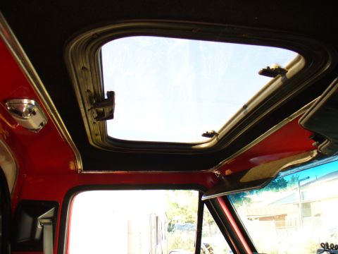 1979 Ford Bronco - Interior view of a 1979 Ford Bronco, highlighting the sunroof mechanism.