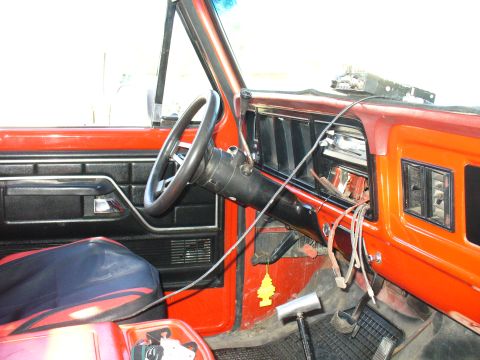 1979 Ford Bronco - The interior of this vehicle shows exposed wiring and a worn dashboard, suggesting it may not be a 1979 Ford Bronco.