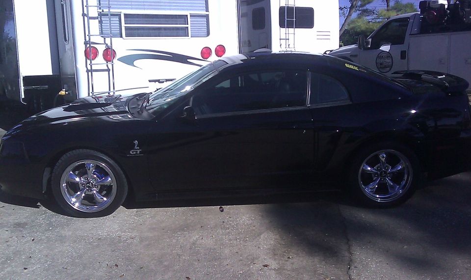 Black 2003 Ford Mustang GT side view
