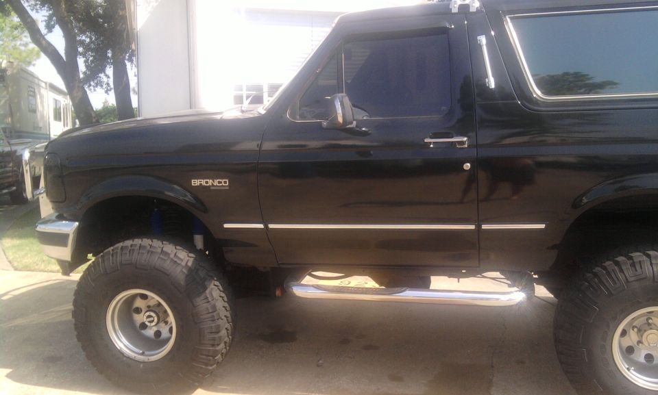 Black 1993 Ford Bronco side view with lifted suspension