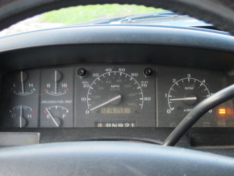 2001 Ford Crown Victoria - Interior view of dashboard gauges including speedometer, tachometer, fuel, and temperature indicators.