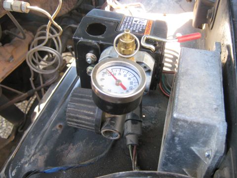 1972 Ford F-250 - Close-up of an air compressor pressure switch and gauge assembly, with wiring visible.