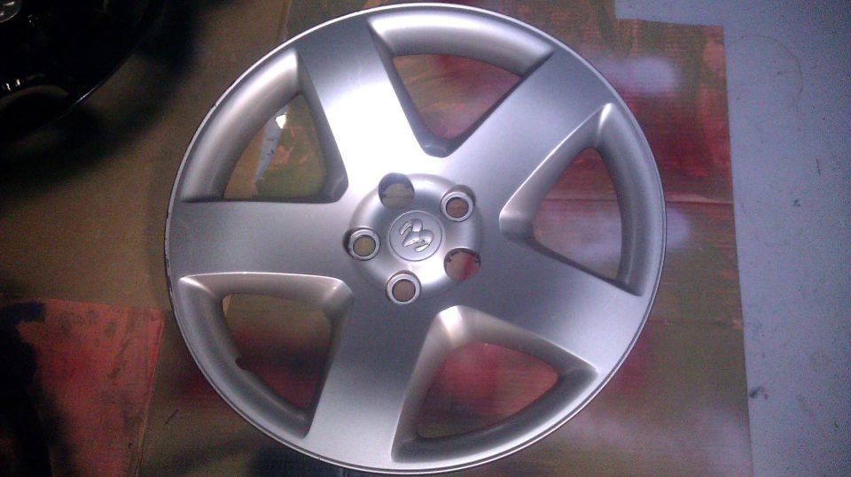 I aquired a used set of the Charger Pursuit wheel covers that fit the 18 inch steel wheel.