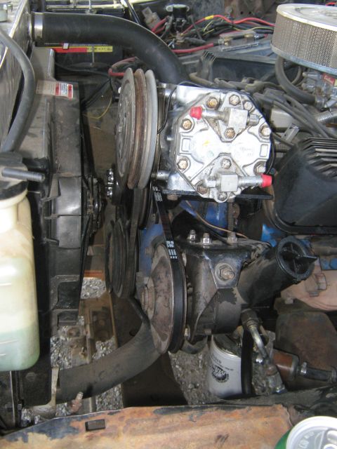 1972 Ford F-250 - Engine bay detail with AC compressor and associated components visible.