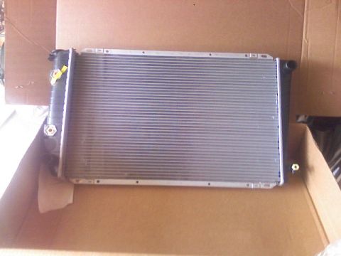 1987 Mercury Grand Marquis - Radiator for a vehicle, shown in its packaging.