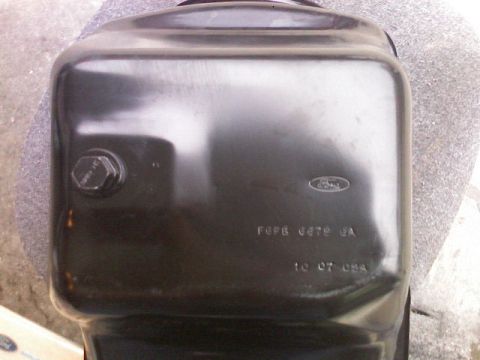 1987 Mercury Grand Marquis - This is a Ford oil pan with stamped part numbers and a manufacturing date.