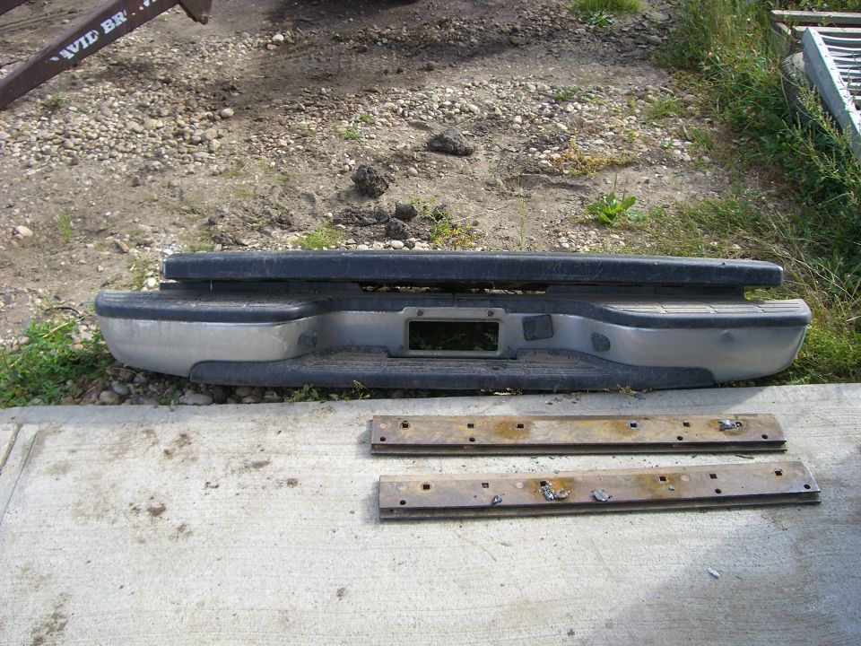 Rear truck bumper with two metal brackets