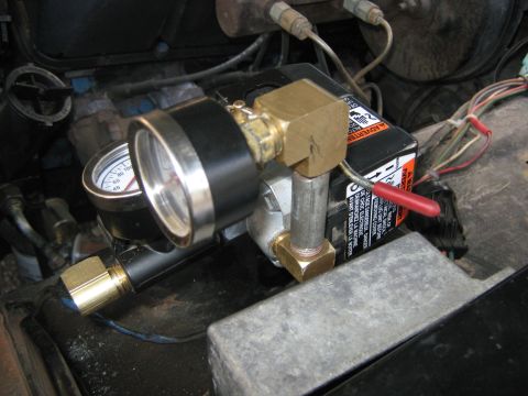 1972 Ford F-250 - Close-up of an air pressure gauge and compressor switch assembly.