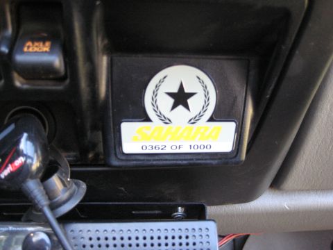 2005 Jeep Wrangler - A close-up of a special edition badge inside a vehicle, indicating it's one of 1000 Sahara models.