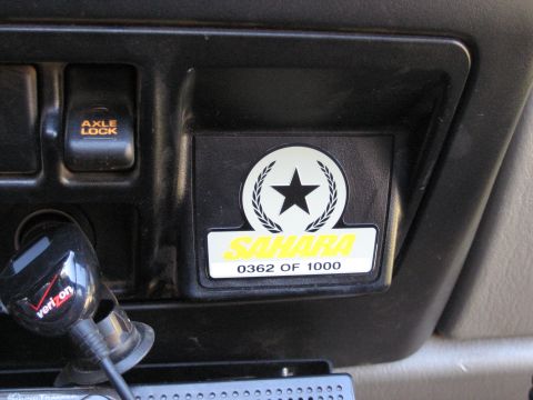 2005 Jeep Wrangler - Interior view of a vehicle dashboard, highlighting a special edition badge and an axle lock control.
