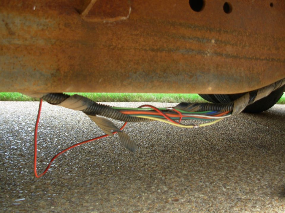 It's really easy to pick up the trailer ground & reverse light circuits here directly below the body plug.