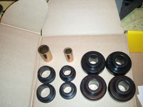 1996 Ford Bronco - New suspension bushings and sleeves are ready for installation.