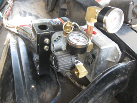 1972 Ford F-250 - Close-up of an air compressor control unit, showing pressure gauges and wiring.