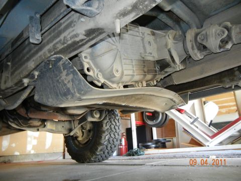 1996 Ford Bronco - Undercarriage view of a vehicle's transmission and driveshaft, with a date stamp of 09.04.2011.