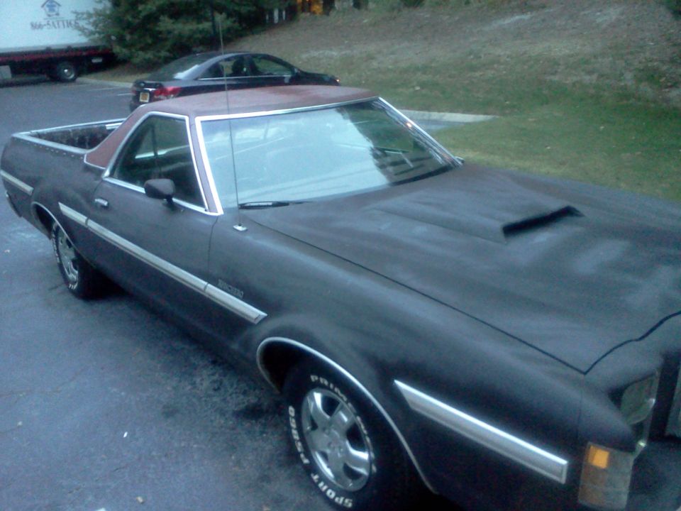 Dark brown 1979 Ford Ranchero with a brown vinyl top and hood scoop