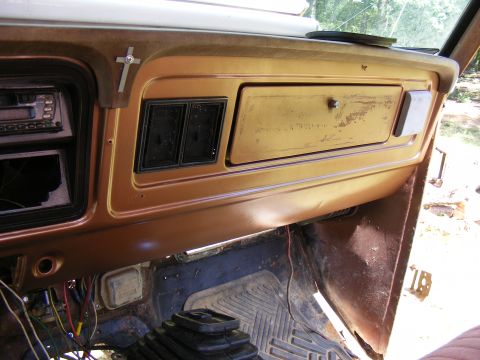 1978 Ford Bronco - Interior view of an older vehicle's dashboard, showing wear and tear.