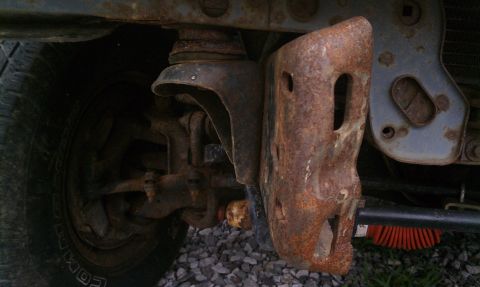 1990 Ford Bronco - Passenger side frame where bumper mounts needs straightened out.