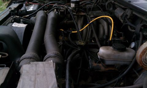 1990 Ford Bronco - Duct tape on air box. Will be installing K&N cold air intake.