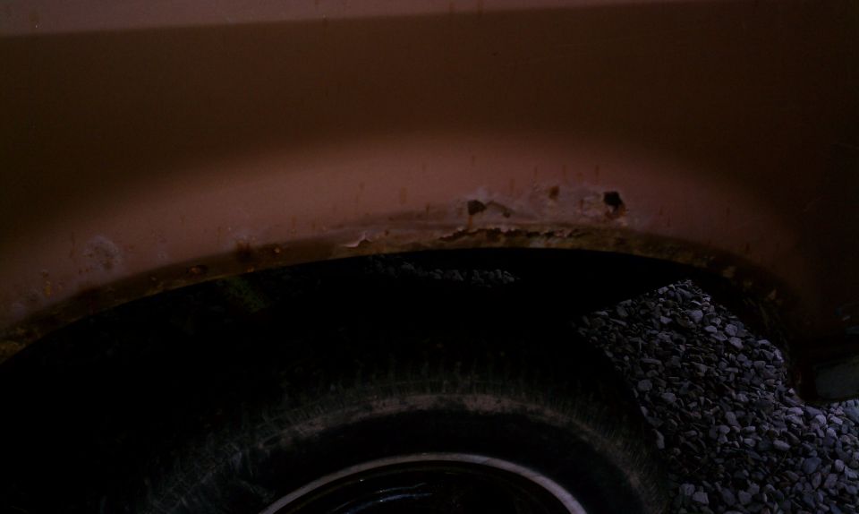 Drivers side rear fender rust, common to Fords of this model year.