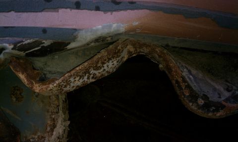 1990 Ford Bronco - Rear drivers side panel with damage from being pulled out of a ditch, hydro planed off-road.