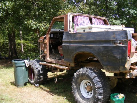 1978 Ford Bronco - This heavily modified 1978 Ford Bronco features a lifted suspension, oversized tires, and custom interior curtains.